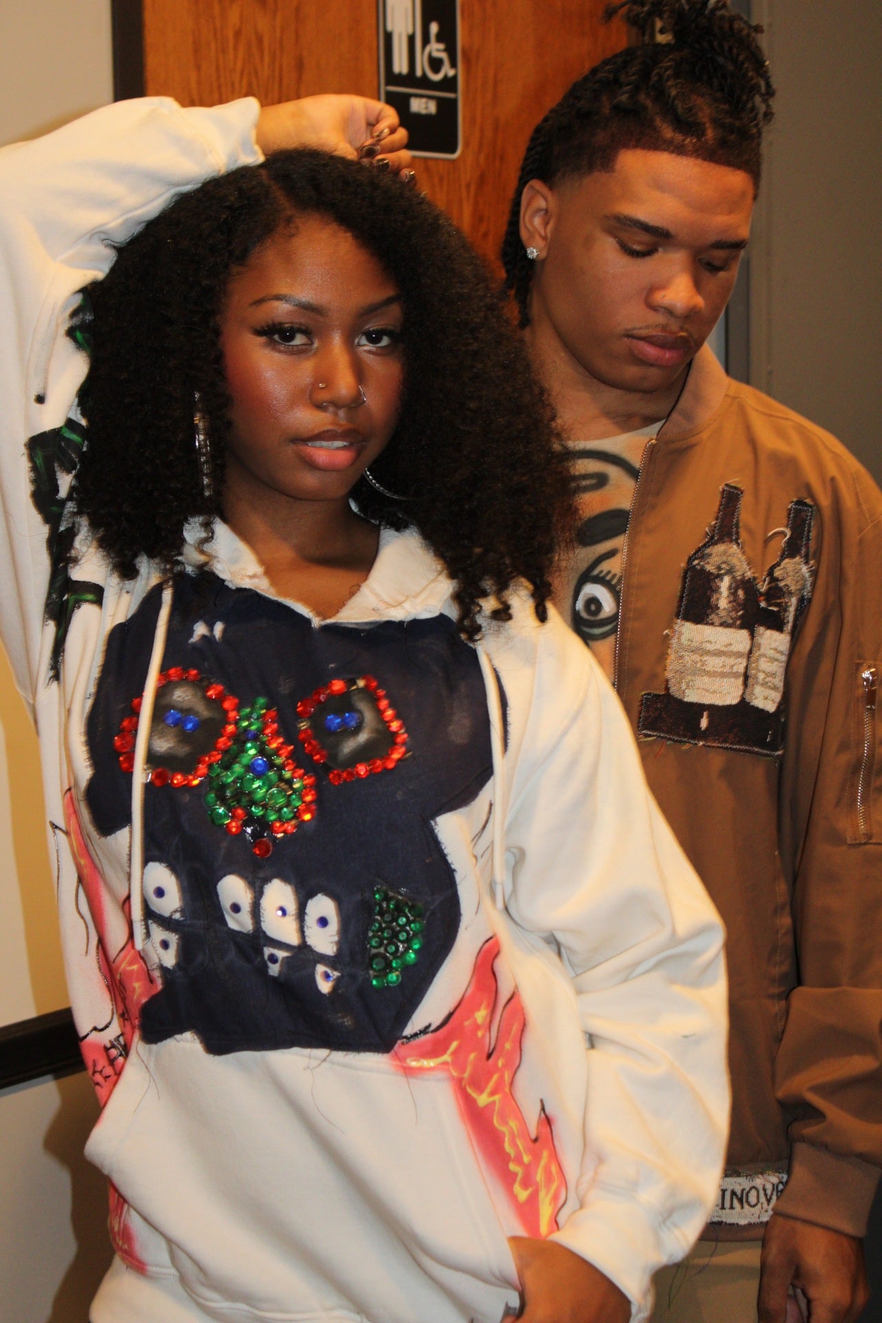 The Art Exhibit fire skull hoodie